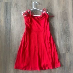 Women’s small red dress.